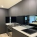 Custom made mirror toughened glass splashback